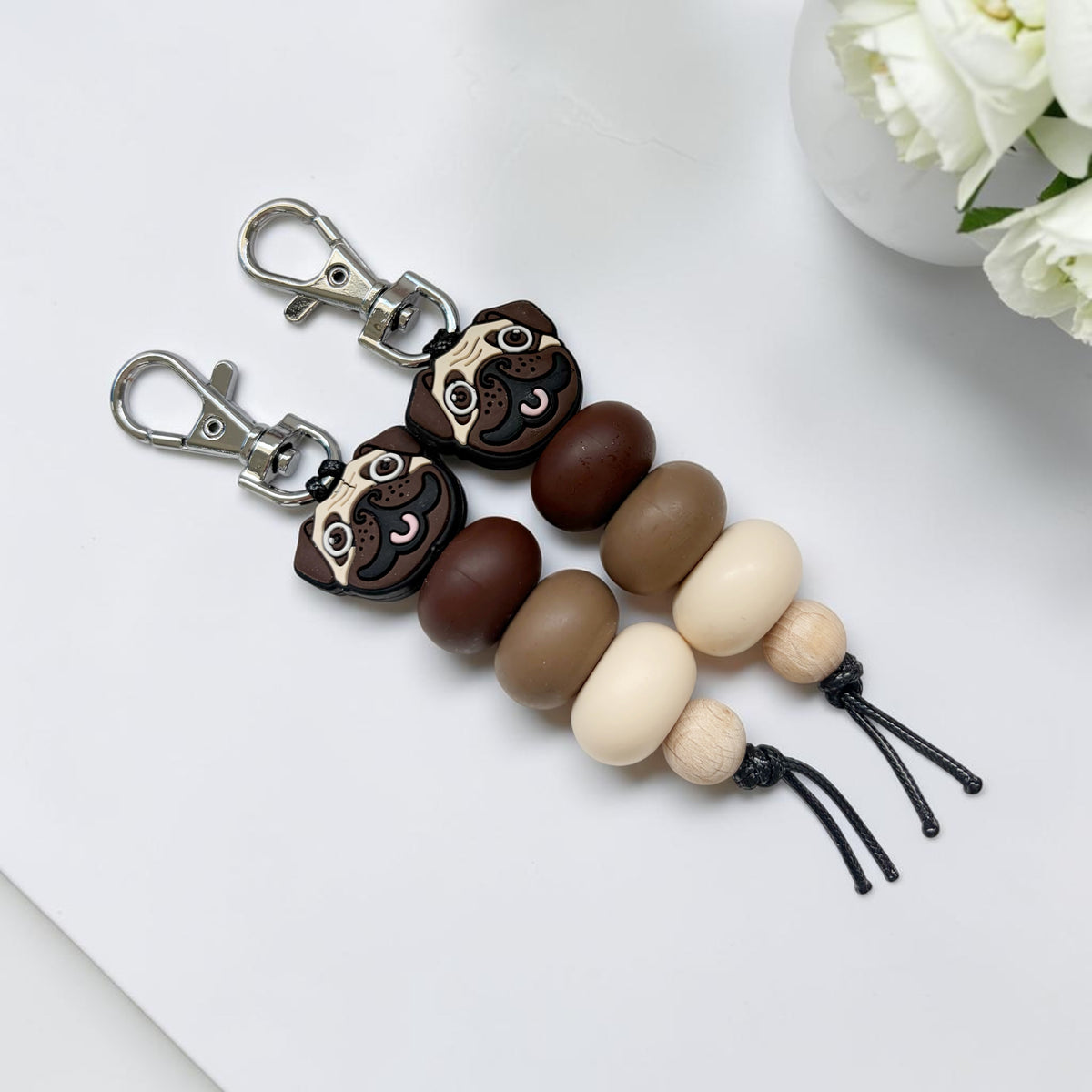 BROWN PUG SILICONE BEAD KEYRING
