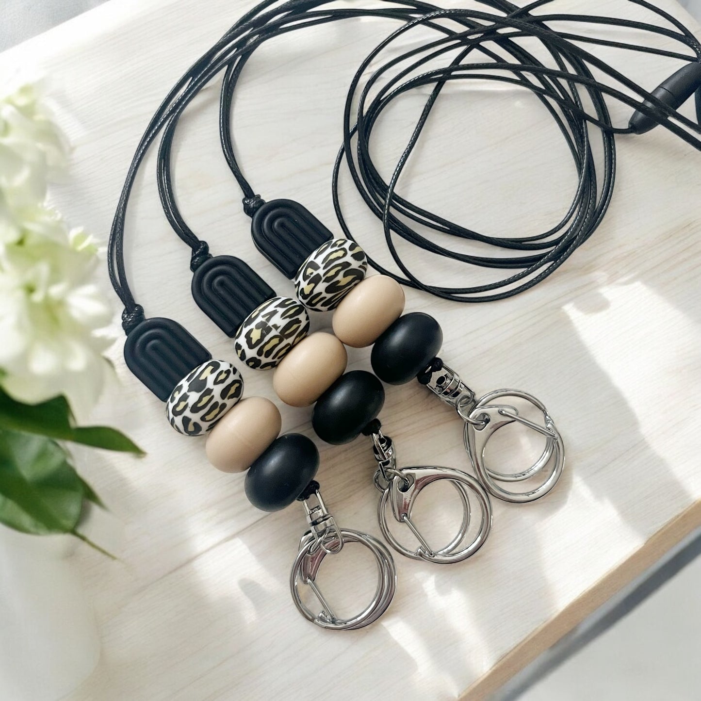 BLACK ARCH LEOPARD PRINT SILICONE BEAD LANYARD