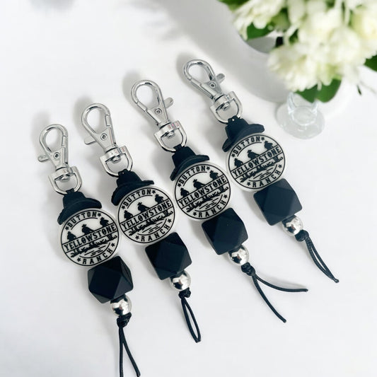 BLACK COWBOY HAT & YELLOWSTONE SILICONE BEAD KEYRING